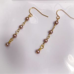 29. Mauve Pearlescent Glass Dangle Earrings
